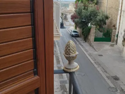 a view of a street from a house door at Casaulente in Alcamo