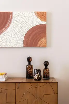 two vases sitting on top of a wooden dresser at Crispi Apartments in Palermo