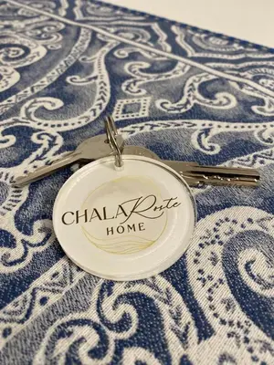 a plate and a spoon on a table at Chalaroste home in Terrasini