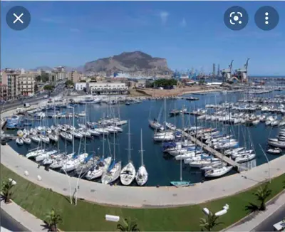 a marina filled with lots of boats in the water at POLITEAMA SUITE IN THE HEART OF THE CITY in Palermo