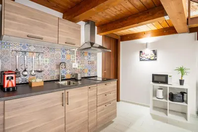 a kitchen with a sink and a counter top at Open Sicily Homes - Near the Central Train Station in Palermo