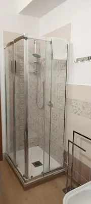a bathroom with a sink and a mirror at SUITE PRINCIPE SCORDIA in Palermo