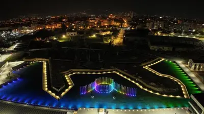 a view of a city at night with lights at Cala Apartment Centre in Palermo