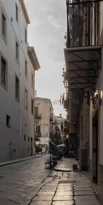 an empty street in a city with buildings at Monolocale Ramondetti Fileti in Palermo