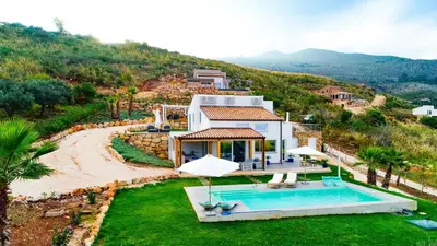 an aerial view of a villa with a swimming pool at Villa Giulietta in Scopello