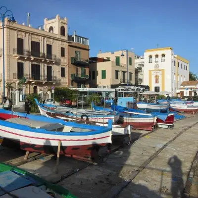 a group of boats are parked in a harbor at Raggio di sole in Ashur in Palermo