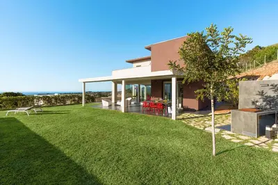 a rendering of a house with a yard at La Dolce Vita in Castellammare del Golfo