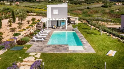 an aerial view of a villa with a swimming pool at DAMA DEI VENTI 6&2, Emma Villas in Castellammare del Golfo