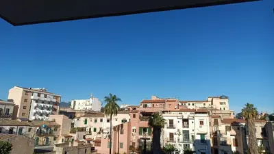 a view of a city with buildings and palm trees at Mi Tierra Luxury Apartments in Palermo
