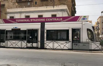 a bus on the side of a city street at Siandri House in Palermo