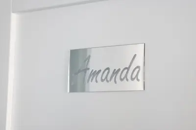 a sign that reads india on a wall at AVA VACATION HOME in Borgetto