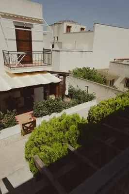 an overhead view of a building with a garden at SanVitoTour- Appartamento Smeraldo in San Vito lo Capo