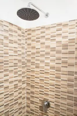 a bathroom with a shower with a drain at Meg Sicily House in Castellammare del Golfo