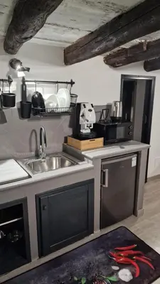 a kitchen with a sink and a counter top at Virginia House 3 in Palermo