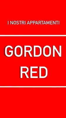 a red sign with the words coron red at RESIDENCE GORDON in Carini