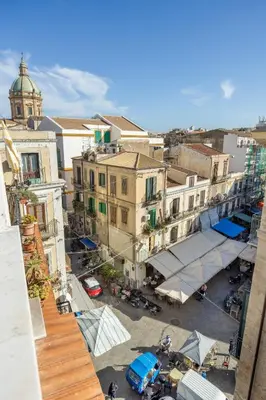 an overhead view of a city with buildings at Suk Ballarò House in Palermo