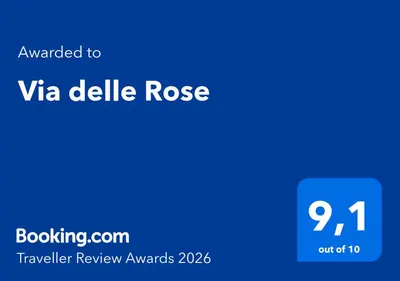 a blue rectangle with the text awarded to va delle rose at Via delle Rose in Torretta