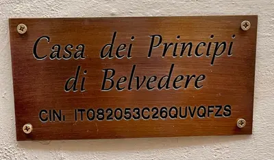 a sign on a wall that reads casa del principal del residence at Casa dei Principi di Belvedere in Palermo