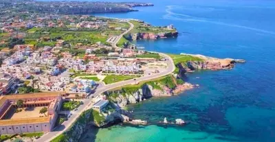 an aerial view of a town and the ocean at Panoramic Villa 200m from the Sea with Heated Pool & Whirpool in Terrasini