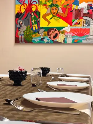 a table topped with a buffet of food and fruit at Crispi 120 Rooms New Opening in Palermo