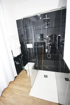 a bathroom with a shower and a toilet at La chiave dei sogni in Palermo