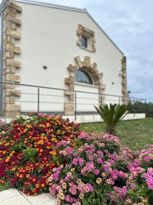 a pile of flowers in front of a church at Villa Fragi in Cinisi