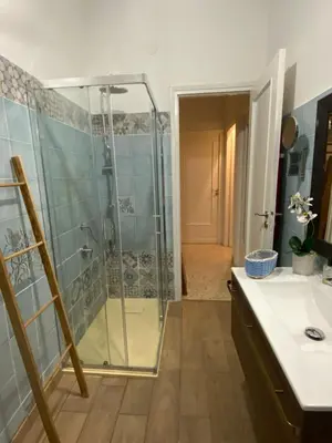 a bathroom with a shower and a sink at Casa Graziusa in Palermo