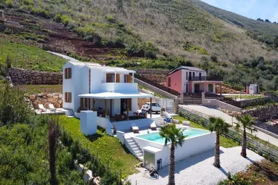 an aerial view of a house with a swimming pool at Villa Bellacosa con Piscina Privata vista mare in Castellammare del Golfo