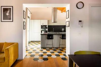 a bathroom with a sink and a mirror and a tub at Pomodoro House allo Spasimo by Wonderful Italy in Palermo